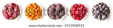 Set of frozen berries. Blackberry, black currant, cranberry, raspberry and sea buckthorn isolated on white background, top view Royalty-Free Stock Photo #1913908933