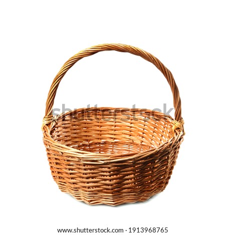 Empty wicker basket isolated on white. Easter item Royalty-Free Stock Photo #1913968765