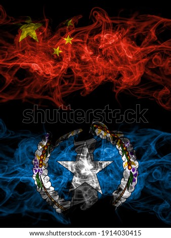 China, Chinese vs United States of America, America, US, USA, American, Northern Mariana Islands smoky mystic flags placed side by side. Thick colored silky abstract smoke flags.