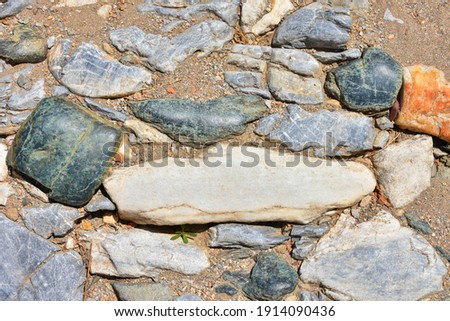Medieval destroyed stones.  Old historical bricks.  Ancient cobblestone path. Destroyed building in Ayasuluk Castle, Turkey. Selective focus. Abstract grunge background 