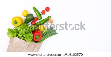 vegetables in grocery paper bag Royalty-Free Stock Photo #1914103570