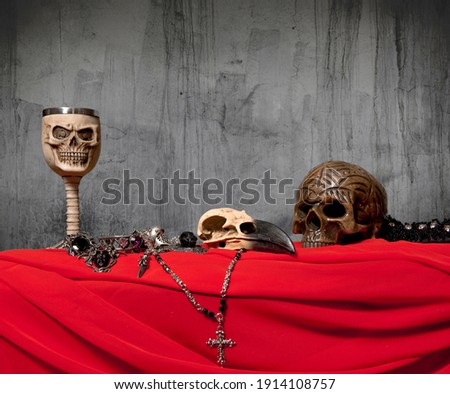 Gothic background. Skull raven crow, human skull on wall background