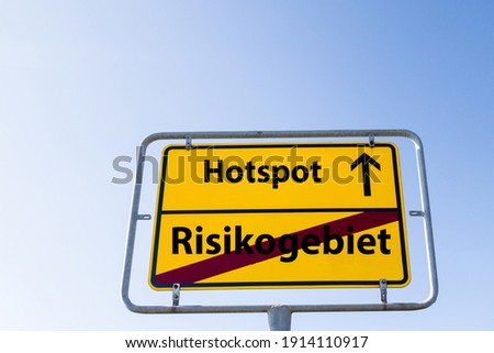 Sign Hotspot Risk Area german "Hotspot Risikogebiet" Royalty-Free Stock Photo #1914110917