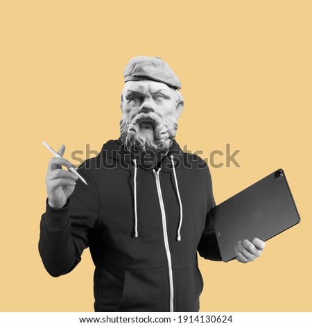 Modern art collage. Concept portrait man holding tablet and pencil. Gypsum head of Socrates.