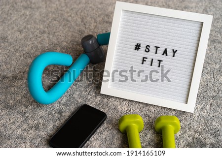"STAY FIT" viral social media message. Physical exercise at home during COVID-19 Coronavirus.