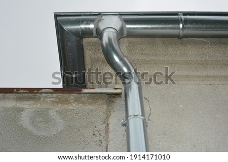 a metal gutter on a house Royalty-Free Stock Photo #1914171010