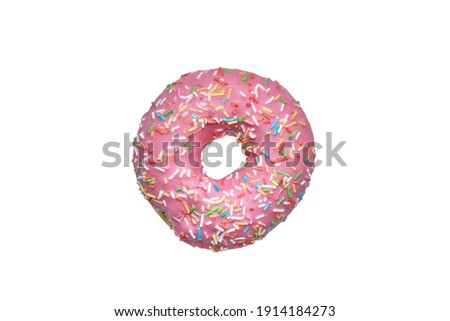 

Pink donut decorated with colorful sprinkles isolated on white background. Flat lay. Top view 