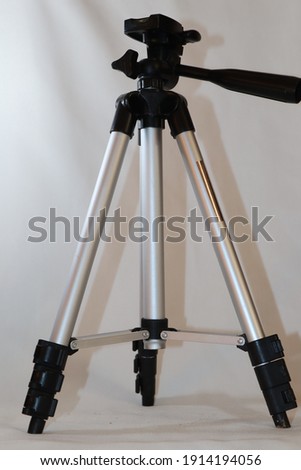 tripod in black and white color in white background