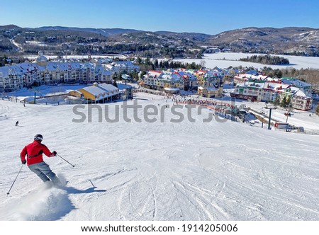 Mont and Lake Tremblant village resort in winter, Quebec, Canada Royalty-Free Stock Photo #1914205006