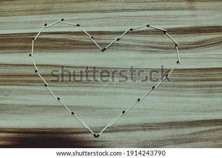 Owerri, Nigeria - February 5th, 2021: Match sticks formed into a heart shape in depiction of love.
