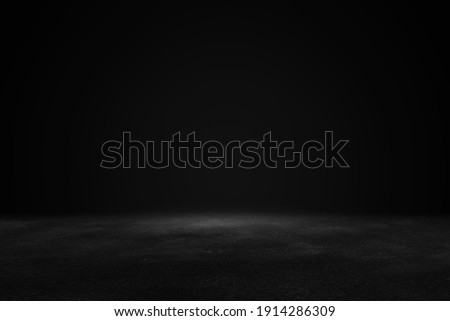 Product showcase. Black studio room background. Use as montage for product display Royalty-Free Stock Photo #1914286309