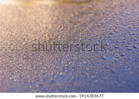 Abstract water drop stain on car with natural background