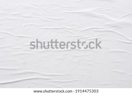 Blank white crumpled and creased paper poster texture background Royalty-Free Stock Photo #1914475303
