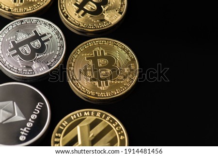 Top overhead close up view photo of pile stack lot many of golden and silver bitcoin litecoin and ethereum isolated over black color table
