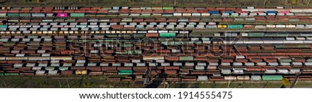 Horizontal long banner Aerial Top view to railway cylindrical tank shipping containers Rail way art Artistic composition Striped creative transport industry representation. railroads and freight train