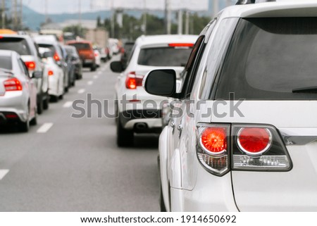 Heavy traffic on long holidays. Traffic jam on a highway. People go on vacation. Rush hour. Royalty-Free Stock Photo #1914650692