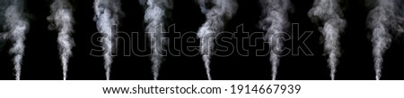 set of white water vapor with spray from the humidifier. Isolated on black background Royalty-Free Stock Photo #1914667939