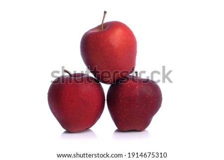 Fresh red Apple fruit with water drops isolated on white background with clipping path.