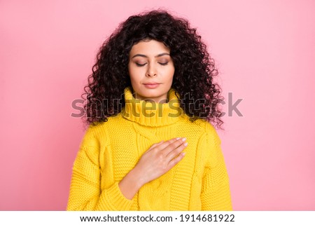 Photo of young attractive latin girl hand on chest calm peaceful isolated over pink color background