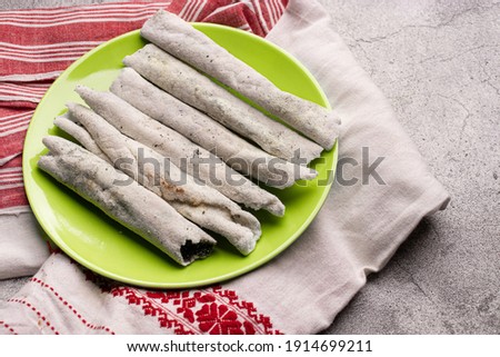 Til pitha a traditional food of Assam  stock image.