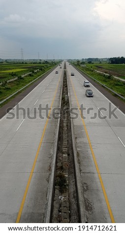 Toll road with a rice field atmosphere