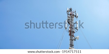 workers are working at 5g antenna tower for maintaining.serves cellular antenna, technician worker repair telecommunication tower on sunlight at background.                               