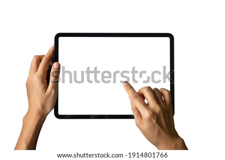 Close-up woman of Left hand held, right hand use finger touches with digital tablet white screen isolated on white background. Concept of technology, connection, communication, social. Royalty-Free Stock Photo #1914801766