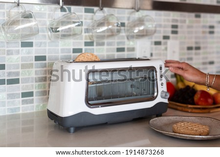 Electric Teapot and Toaster in Kitchen