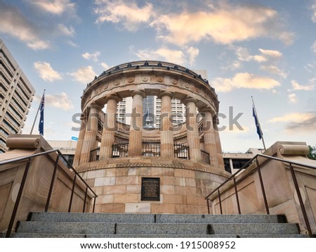Anzac day monument in a public square during sunset, in Brisbane, Australia. Royalty-Free Stock Photo #1915008952