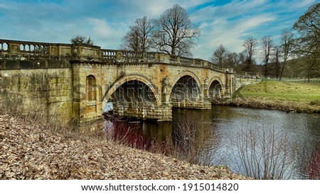 A magnificent bridge over the River Derwent in Derbyshire Royalty-Free Stock Photo #1915014820