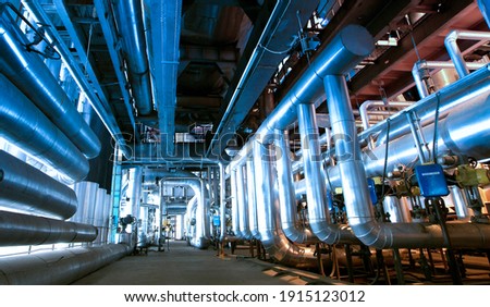 Industrial zone, Steel pipelines and valves Royalty-Free Stock Photo #1915123012