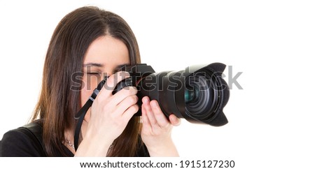 panoramic shot of woman brunette photographer with digital camera isolated on white background 