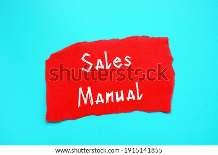 Financial concept about Sales Manual with sign on the page.
