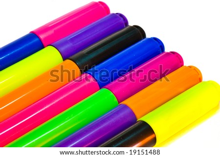 varicoloured markers on the white isolated background