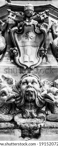 Detailed view of decoration Fontana del Pantheon - fountain located in Piazza della Rotonda, near Pantheon, Rome, Italy. Black and white image.