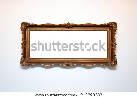Elegant old blank white picture frame template, empty inside. Elegant wide painting frame hanging on the wall, copy space, mockup. Simple photo frame, art gallery exhibition, museum abstract concept