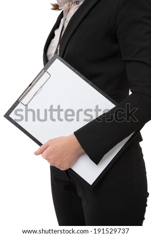 A pretty businesswoman carrying an empty clipboard
