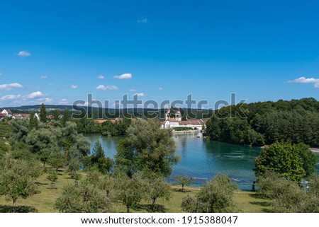 Landscape with the river Rhine and the former monastery Rheinau. Canton of Zuerich in Switzerland