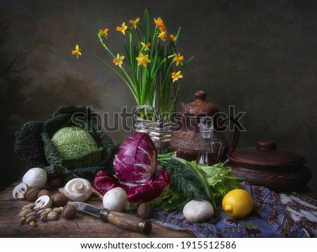 Still life with vegetable and bouquet of daffodils