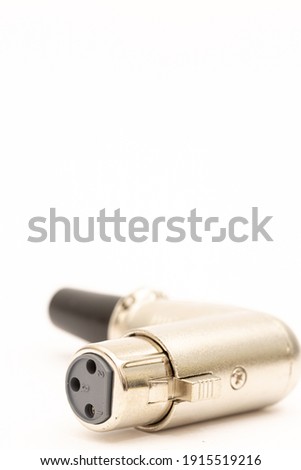 Microphone xlr female input isolated above white background.