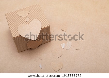 craft cut heart on a cardboard gift box with a place to write