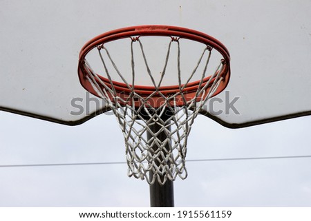 Photo of basketball hoop with the board on the sky background