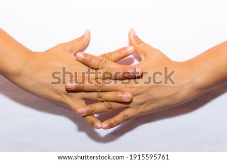 Gestures of greeting and success with one hand and two hands