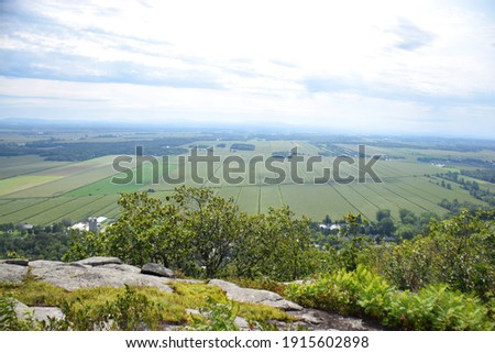 Mont Saint-Grégoire, Cime Haut-Richelieu, Quebec, Canada: View at the summit of farmlands Royalty-Free Stock Photo #1915602898