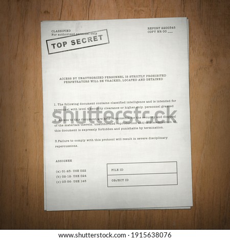 top secret document on wooden desk background Royalty-Free Stock Photo #1915638076