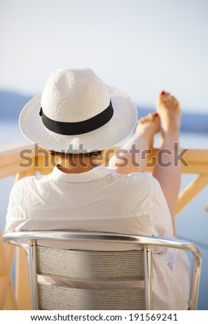 Woman enjoying sun on the tropic island
