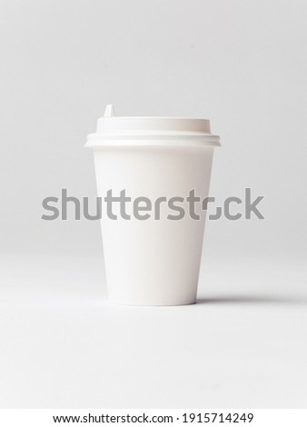 Coffee Cup set - Mockup template for cafes, design of the restaurant's corporate style. White cardboard coffee cup Mockup. Template disposable plastic and paperware for hot drinks Royalty-Free Stock Photo #1915714249
