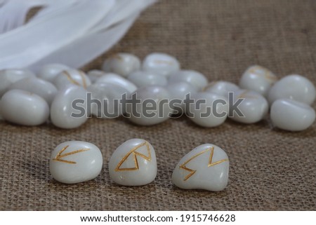 Runes are made of white stones. This picture is used to accompany an article about the Runes.