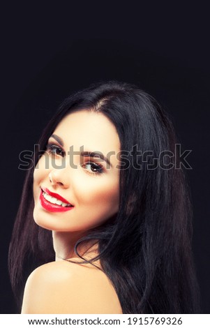 Attractive girl smiling beauty portrat, bright make-up, black background