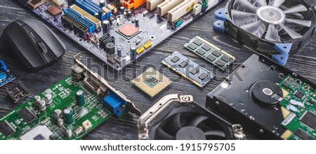 The computer hardware configuration is laid out on a dark background. The concept of a modern solid-state digital technology Royalty-Free Stock Photo #1915795705